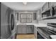 Spacious kitchen with stainless steel appliances and updated countertops at 6036 Epping Forest Dr, Raleigh, NC 27613