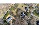 An aerial perspective highlights the property's layout, surrounding trees, and neighborhood landscape at 6532 Wakefalls Dr, Wake Forest, NC 27587