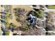 Aerial image captures the home's setting, tree coverage, and circular driveway from above at 6532 Wakefalls Dr, Wake Forest, NC 27587