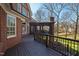Exterior showcasing a multi-level deck and patio with brick accents, perfect for outdoor living at 6532 Wakefalls Dr, Wake Forest, NC 27587