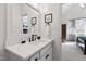 Stylish bathroom featuring a white countertop, modern sink and faucet, and a mirror over the sink at 6532 Wakefalls Dr, Wake Forest, NC 27587