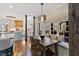 Charming breakfast nook features a built-in bench, wooden table, and large windows for natural light at 6532 Wakefalls Dr, Wake Forest, NC 27587
