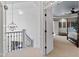 Bright foyer with an ornate chandelier and an open door to the main bedroom at 6532 Wakefalls Dr, Wake Forest, NC 27587
