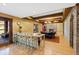 Spacious kitchen with granite countertops, stainless steel appliances, and breakfast bar at 6532 Wakefalls Dr, Wake Forest, NC 27587