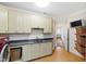 Laundry area with sink, basket storage, and adjacent access to more rooms at 6532 Wakefalls Dr, Wake Forest, NC 27587