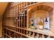 Climate controlled wine cellar featuring custom wood racking, and space for displays at 6532 Wakefalls Dr, Wake Forest, NC 27587
