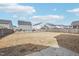 Large backyard with a fenced perimeter and a concrete patio, perfect for outdoor entertaining at 730 Tibumoll Ln, Fuquay Varina, NC 27526