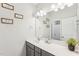 Bright bathroom featuring modern fixtures, a large mirror, and stylish decor at 730 Tibumoll Ln, Fuquay Varina, NC 27526