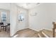 Bright foyer with a view of the front door and coat hooks at 730 Tibumoll Ln, Fuquay Varina, NC 27526