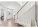 Bright foyer features a staircase, light wood floors, and neutral paint at 730 Tibumoll Ln, Fuquay Varina, NC 27526
