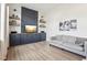 Open living space with custom shelving, media center, and comfortable seating at 730 Tibumoll Ln, Fuquay Varina, NC 27526