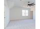 Bedroom with a modern ceiling fan, soft carpet, and a bright window, offering a comfortable space at 75 Harvest View Way, Franklinton, NC 27525