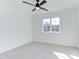 Bright bedroom with carpet, ceiling fan and a window with natural light at 75 Harvest View Way, Franklinton, NC 27525