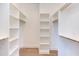Spacious walk-in closet with ample shelving and hanging space for organized storage solutions at 75 Harvest View Way, Franklinton, NC 27525