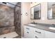 Nicely updated bathroom with large walk-in shower and a dual sink vanity at 7722 Nc 27 W, Lillington, NC 27546