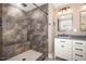 Newly renovated bathroom with tile shower, modern vanity, and updated fixtures at 7722 Nc 27 W, Lillington, NC 27546
