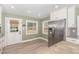 This kitchen includes stainless steel appliances, lots of light, and easy access to the back yard at 7722 Nc 27 W, Lillington, NC 27546