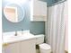 This bathroom features a vanity, mirror, toilet, and bathtub with a shower curtain and white walls at 8 Weeping Beech Way, Durham, NC 27713