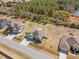 Aerial view of a home with a large, fenced backyard in a beautiful neighborhood at 99 Preserve Dr, Benson, NC 27504
