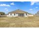 Spacious backyard with a well-maintained lawn and white privacy fence at 99 Preserve Dr, Benson, NC 27504