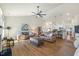 Open floor plan with hardwood floors, comfortable seating, and modern lighting at 99 Preserve Dr, Benson, NC 27504