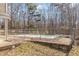 Fenced-in backyard with covered pool, offering a private outdoor space at 10611 Quail Roost Rd, Bahama, NC 27503