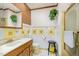 Bathroom featuring tile floors, cabinets and a mirror at 10611 Quail Roost Rd, Bahama, NC 27503