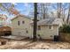 Two-story home exterior featuring wooden deck and fenced-in backyard at 1195 Champion Dr, Cary, NC 27511