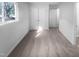 Bright bedroom features neutral carpet and a window at 1216 Armstrong Cir, Raleigh, NC 27610