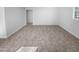 Open floor plan with resilient floors leads to a doorway at 1216 Armstrong Cir, Raleigh, NC 27610