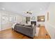 Cozy living room with hardwood floors, fireplace, stylish furnishings and lots of light at 1305 Bridgeport Dr, Raleigh, NC 27615