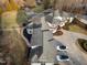 Luxury home boasting meticulous landscaping, a winding driveway, and a detached garage at 1326 Lochshire Dr, Burlington, NC 27215