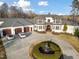 Estate with sprawling driveway, beautiful fountain, and ample parking for multiple vehicles at 1326 Lochshire Dr, Burlington, NC 27215