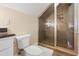 Bathroom featuring glass-enclosed shower, vanity, and a modern toilet at 1326 Lochshire Dr, Burlington, NC 27215