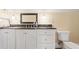 Bathroom featuring vanity with a black countertop and a modern toilet at 1326 Lochshire Dr, Burlington, NC 27215