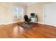 Bright bedroom featuring hardwood floors, natural light, and neutral paint at 1326 Lochshire Dr, Burlington, NC 27215