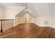 Finished bonus room space offering hardwood floors, stairs and storage space at 1326 Lochshire Dr, Burlington, NC 27215
