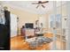 Bright office space featuring hardwood floors, natural light, and a faux fur rug at 1326 Lochshire Dr, Burlington, NC 27215