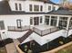 Stunning home featuring a walk-out deck, sunroom, and meticulously landscaped garden at 1326 Lochshire Dr, Burlington, NC 27215