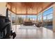 Relaxing sun room with wood ceiling, ceiling fan, neutral furniture and lots of natural light at 1326 Lochshire Dr, Burlington, NC 27215