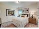 Stylish bedroom featuring elegant decor, plush bedding, and coordinated furnishings at 135 Baneberry Dr, Broadway, NC 27505