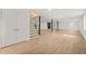 Spacious finished basement with stairs, open floor plan, and modern flooring at 1411 Rosewood St, Durham, NC 27701
