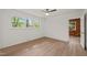 Well-lit bedroom with hard surface flooring, and a window with great natural light at 1411 Rosewood St, Durham, NC 27701