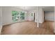 Bright living space with large window and wood flooring, great for entertaining guests at 1411 Rosewood St, Durham, NC 27701