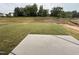 Spacious backyard with newly installed grass and a concrete patio perfect for outdoor activities at 149 Ethel Ln, Angier, NC 27501