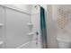 Clean bathroom featuring a shower-tub combination and a contemporary geometric accent at 149 Ethel Ln, Angier, NC 27501
