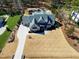 Aerial view of the home showcasing the large lot, driveway, and professional landscaping at 1520 Grand Willow Way, Raleigh, NC 27614