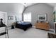 Cozy bedroom with vaulted ceiling, neutral colors, and well-coordinated decor at 1520 Grand Willow Way, Raleigh, NC 27614