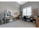 Spacious bonus room with vaulted ceilings, neutral colors, and dual work spaces offers a flexible area for hobbies at 1520 Grand Willow Way, Raleigh, NC 27614