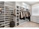 Organized walk-in closet with custom shelving and ample storage space at 1520 Grand Willow Way, Raleigh, NC 27614